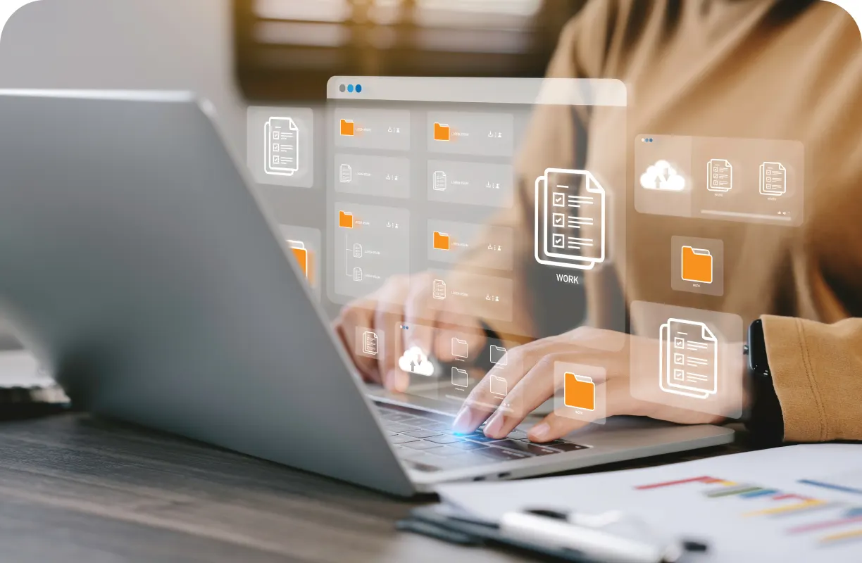 Hands on a laptop keyboard, with document and folder icons floating above it